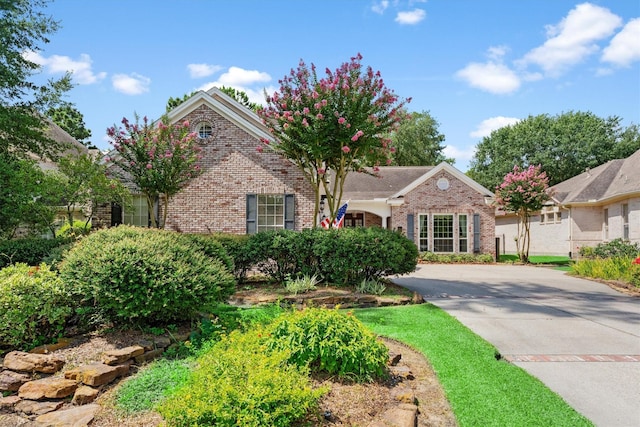 15 S Lakemist Harbour Pl, The Woodlands, TX 77381 - view of front of house with brick siding