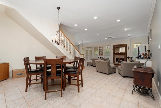 15 S Lakemist Harbour Pl, The Woodlands, TX 77381 - dining space featuring crown molding, light tile patterned floors, recessed lighting, a ceiling fan, and a chandelier