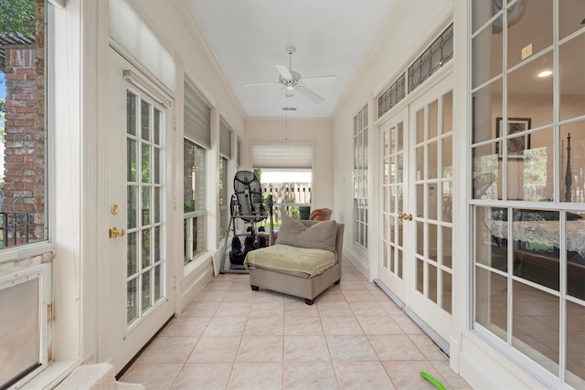 15 S Lakemist Harbour Pl, The Woodlands, TX 77381 - sunroom featuring french doors, a ceiling fan, crown molding, and tile patterned flooring