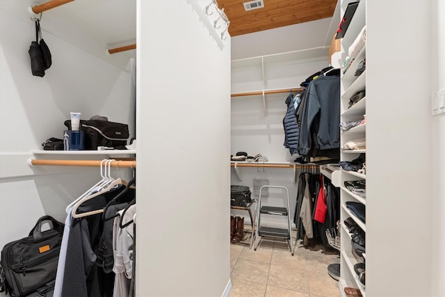 15 S Lakemist Harbour Pl, The Woodlands, TX 77381 - spacious closet featuring tile patterned floors