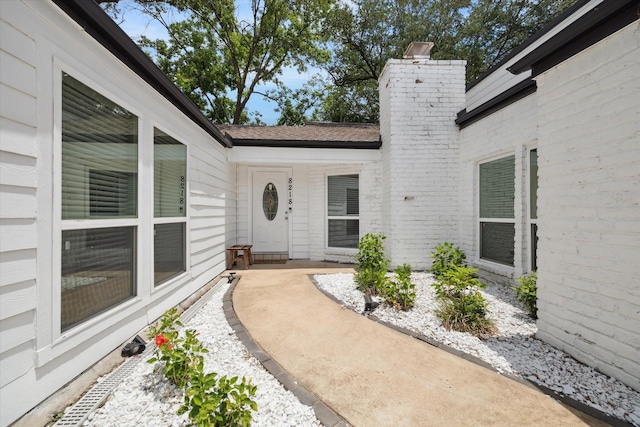 8218 Waynemer Way, Houston, TX 77040 - entrance to property with a chimney