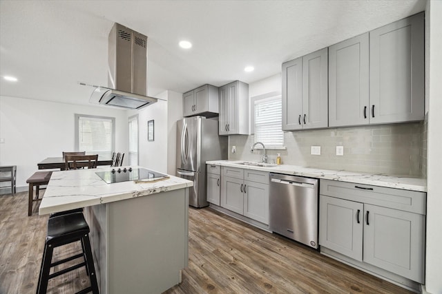 8218 Waynemer Way, Houston, TX 77040 - kitchen featuring stainless steel appliances, gray cabinets, island range hood, dark wood-style flooring, and recessed lighting