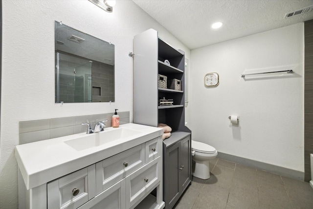 8218 Waynemer Way, Houston, TX 77040 - bathroom featuring vanity, tile patterned floors, a textured ceiling, and a shower