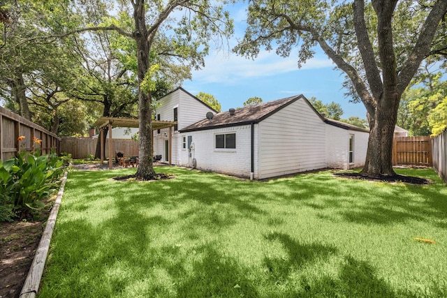 8218 Waynemer Way, Houston, TX 77040 - back of property featuring brick siding and a fenced backyard
