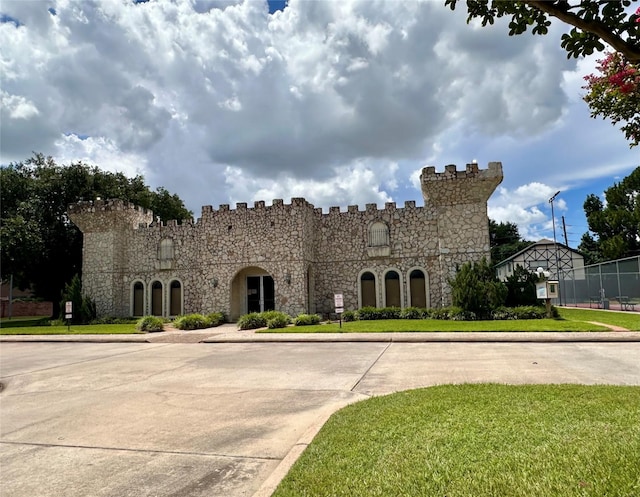 8218 Waynemer Way, Houston, TX 77040 - mediterranean / spanish-style home with stone siding