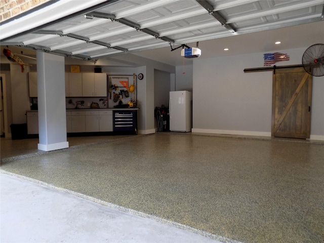 12636 Briar Patch Rd, Houston, TX 77077 - garage with freestanding refrigerator, a garage door opener, and recessed lighting
