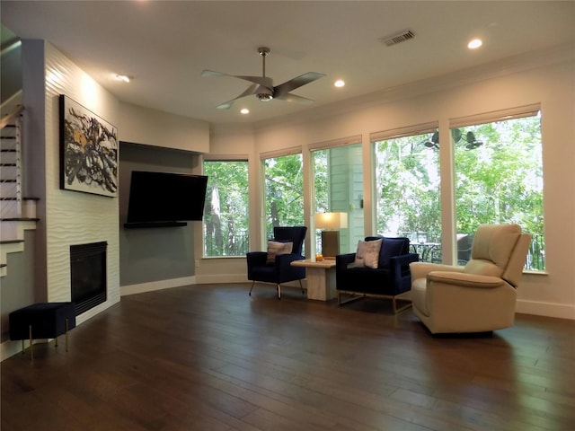 12636 Briar Patch Rd, Houston, TX 77077 - living area with a ceiling fan, plenty of natural light, hardwood / wood-style floors, a glass covered fireplace, and recessed lighting