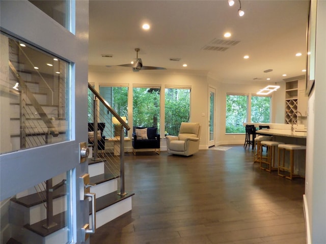 12636 Briar Patch Rd, Houston, TX 77077 - living room with stairway, recessed lighting, dark wood finished floors, and ceiling fan