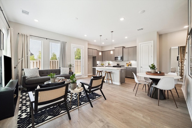 6024 T C Jester Blvd, Houston, TX 77091 - living area with light wood-type flooring and recessed lighting