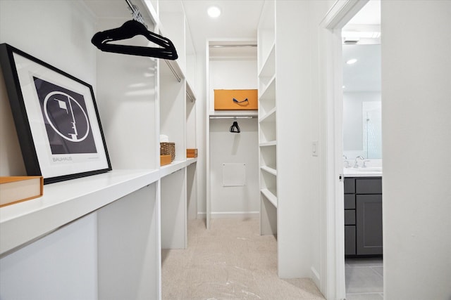 6024 T C Jester Blvd, Houston, TX 77091 - walk in closet with a sink and light colored carpet