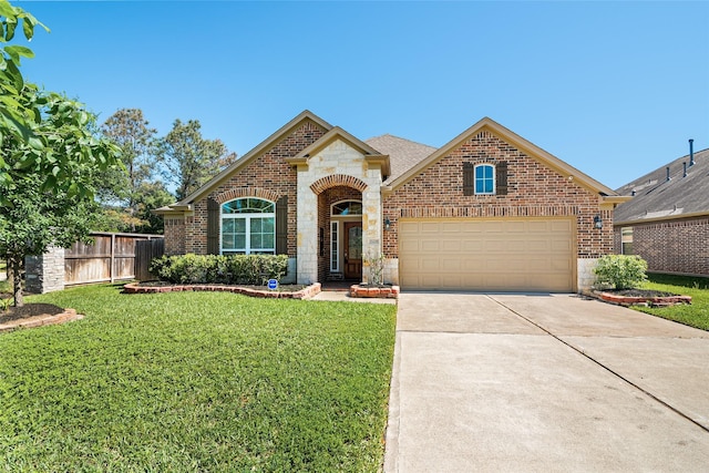 15218 Zenith Glen Ln, Cypress, TX 77429 - view of front of home with brick siding, a garage, concrete driveway, and stone siding