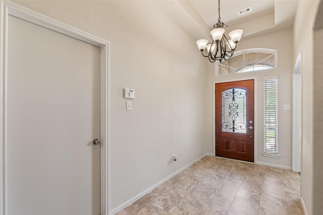 15218 Zenith Glen Ln, Cypress, TX 77429 - entryway featuring a chandelier and baseboards