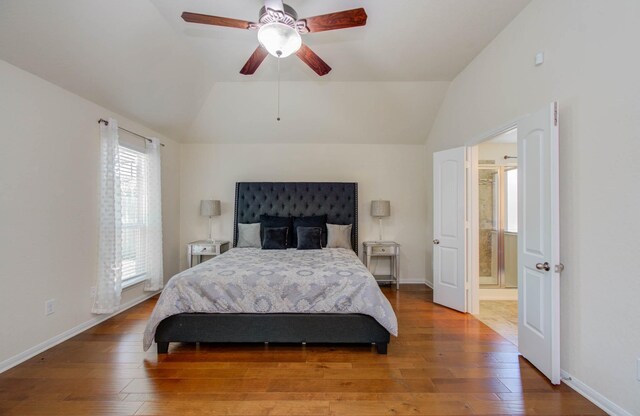 15218 Zenith Glen Ln, Cypress, TX 77429 - bedroom featuring vaulted ceiling, wood-type flooring, ensuite bathroom, and a ceiling fan