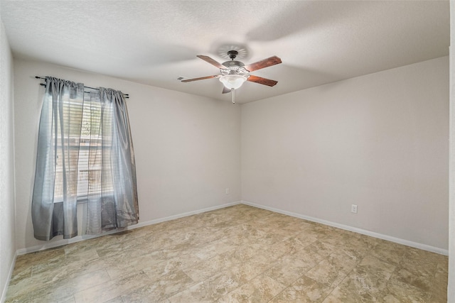 15218 Zenith Glen Ln, Cypress, TX 77429 - spare room with a ceiling fan and a textured ceiling