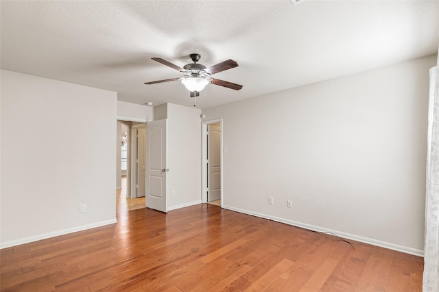15218 Zenith Glen Ln, Cypress, TX 77429 - spare room with ceiling fan and light wood-type flooring