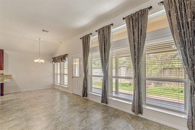15218 Zenith Glen Ln, Cypress, TX 77429 - unfurnished dining area featuring a chandelier and vaulted ceiling