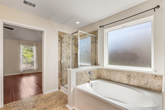 15218 Zenith Glen Ln, Cypress, TX 77429 - bathroom featuring a garden tub, a shower stall, and recessed lighting