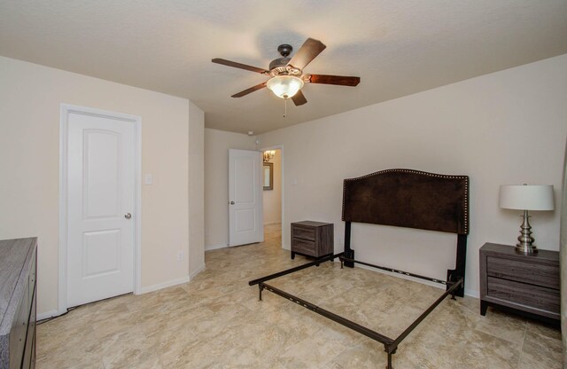 15218 Zenith Glen Ln, Cypress, TX 77429 - bedroom featuring ceiling fan and baseboards