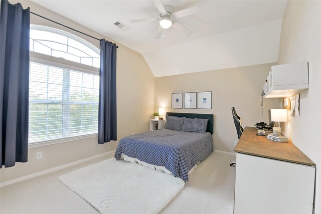 19538 Salt Grass Meadow Dr, Cypress, TX 77433 - bedroom featuring carpet flooring, vaulted ceiling, multiple windows, and a ceiling fan