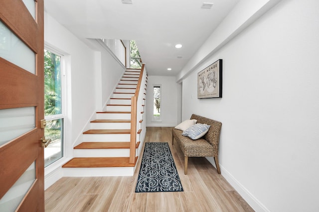 300 Narcissus Rd, Clear Lake Shores, TX 77565 - entryway featuring stairway, wood finished floors, healthy amount of natural light, and recessed lighting
