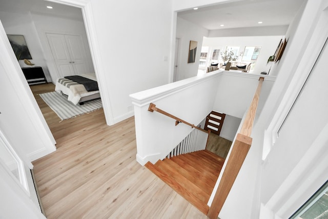 300 Narcissus Rd, Clear Lake Shores, TX 77565 - stairway with wood finished floors and recessed lighting