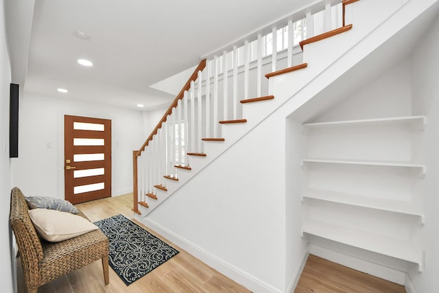 300 Narcissus Rd, Clear Lake Shores, TX 77565 - staircase with wood finished floors and recessed lighting