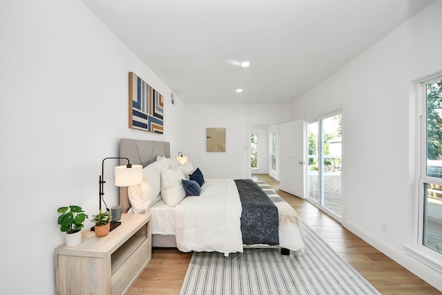 300 Narcissus Rd, Clear Lake Shores, TX 77565 - bedroom with access to outside, light wood finished floors, and recessed lighting