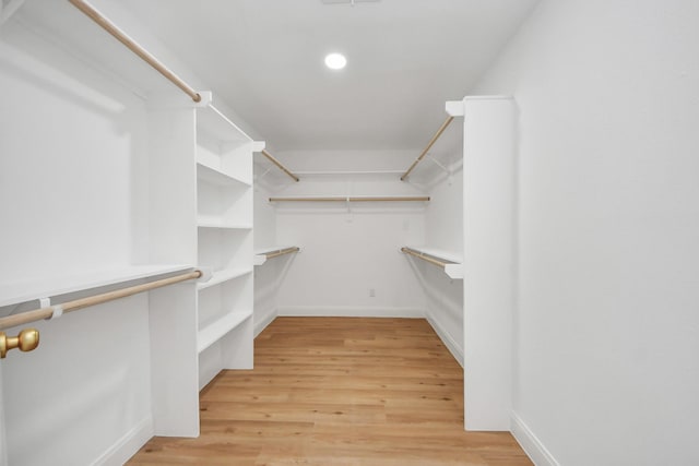 300 Narcissus Rd, Clear Lake Shores, TX 77565 - spacious closet featuring light wood finished floors