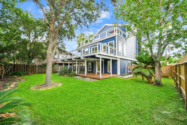 300 Narcissus Rd, Clear Lake Shores, TX 77565 - rear view of property featuring a deck and a fenced backyard