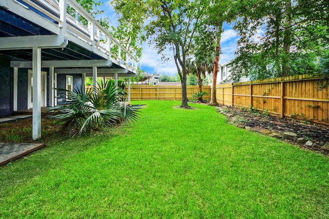 300 Narcissus Rd, Clear Lake Shores, TX 77565 - fenced backyard featuring a deck