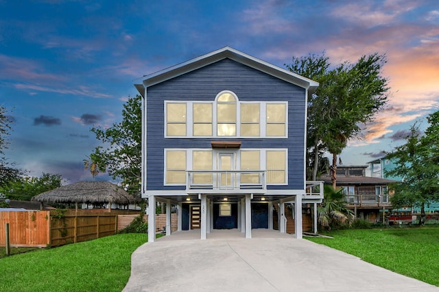 300 Narcissus Rd, Clear Lake Shores, TX 77565 - view of front of property with a carport, driveway, and stairs