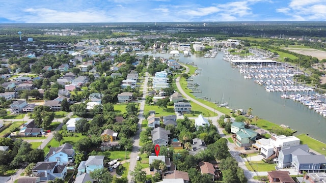 300 Narcissus Rd, Clear Lake Shores, TX 77565 - aerial overview of property's location with a large body of water and nearby suburban area