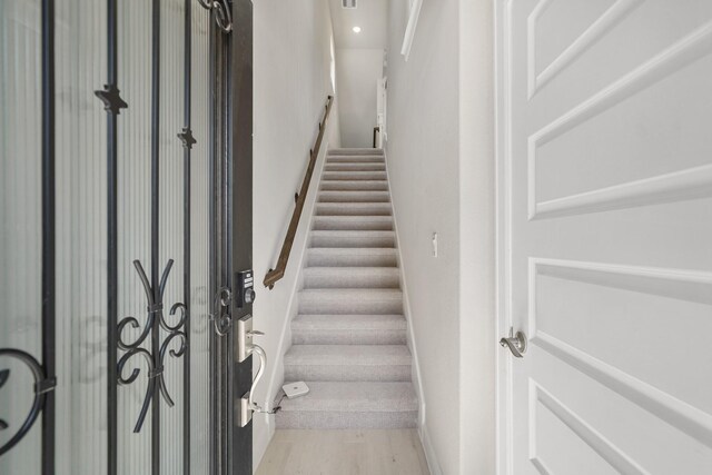 11929 Primrose Creek Trl, Houston, TX 77051 - stairway featuring wood finished floors