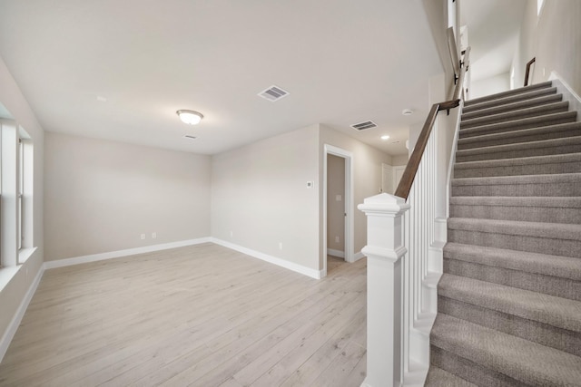 11929 Primrose Creek Trl, Houston, TX 77051 - stairway featuring wood finished floors and recessed lighting