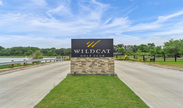 11929 Primrose Creek Trl, Houston, TX 77051 - community / neighborhood sign featuring a water view and view of scattered trees