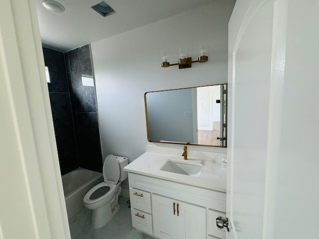 8128 Penrod St, Houston, TX 77028 - full bathroom featuring vanity, marble finish flooring, and washtub / shower combination