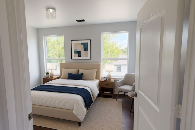 8128 Penrod St, Houston, TX 77028 - bedroom featuring wood finished floors
