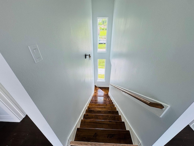 8128 Penrod St, Houston, TX 77028 - stairway featuring wood finished floors and healthy amount of natural light