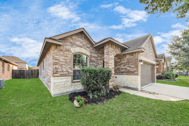18614 Magnolia Dell Dr, Cypress, TX 77433 - french country home featuring brick siding, concrete driveway, and a garage