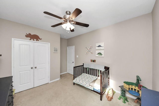 18614 Magnolia Dell Dr, Cypress, TX 77433 - carpeted bedroom with a closet, a ceiling fan, and a crib