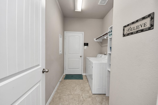 18614 Magnolia Dell Dr, Cypress, TX 77433 - laundry room with separate washer and dryer and baseboards