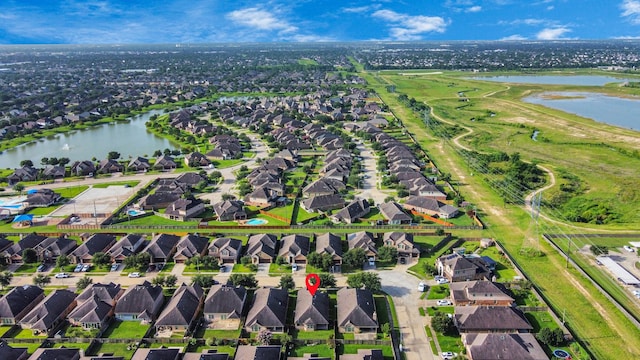18614 Magnolia Dell Dr, Cypress, TX 77433 - aerial view of property and surrounding area with nearby suburban area and a nearby body of water