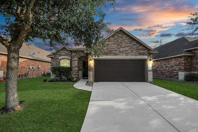 18614 Magnolia Dell Dr, Cypress, TX 77433 - view of front facade featuring driveway, a front lawn, brick siding, and an attached garage
