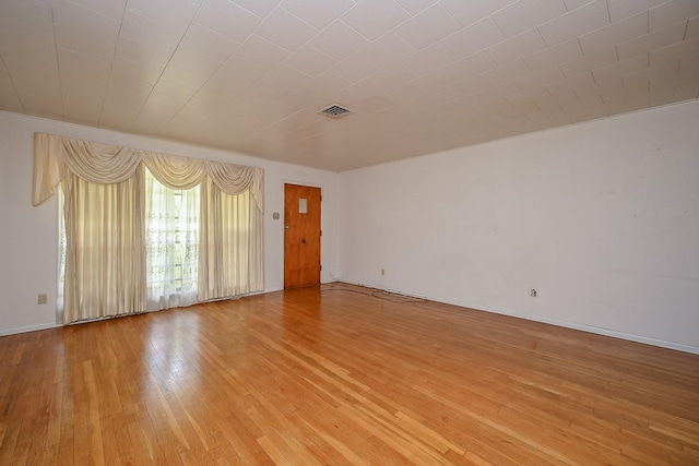 702 Mcdaniel St, Houston, TX 77022 - empty room featuring light wood-type flooring and baseboards