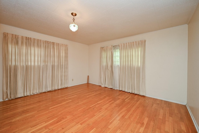 702 Mcdaniel St, Houston, TX 77022 - empty room with light wood-type flooring and baseboards