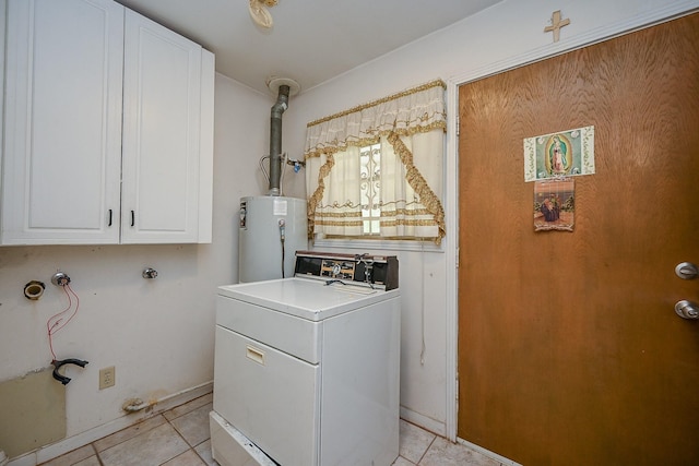 702 Mcdaniel St, Houston, TX 77022 - washroom with washer / clothes dryer, water heater, cabinet space, and light tile patterned floors