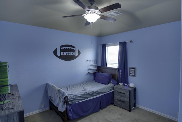 17410 Sandalisle Ln, Richmond, TX 77407 - carpeted bedroom with baseboards and ceiling fan