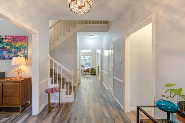 5631 Spring Lodge Dr, Houston, TX 77345 - foyer entrance with stairway and wood finished floors