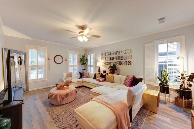 5631 Spring Lodge Dr, Houston, TX 77345 - living area featuring ornamental molding, wood finished floors, and ceiling fan