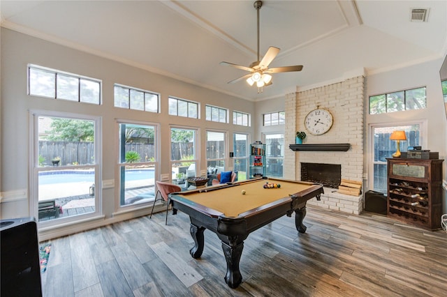 5631 Spring Lodge Dr, Houston, TX 77345 - recreation room featuring billiards table, ornamental molding, wood finished floors, and plenty of natural light